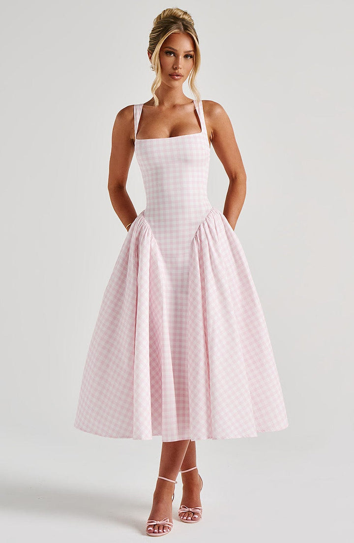Women's pink gingham midi dress with square neck and sleeveless design, perfect for summer casual wear.