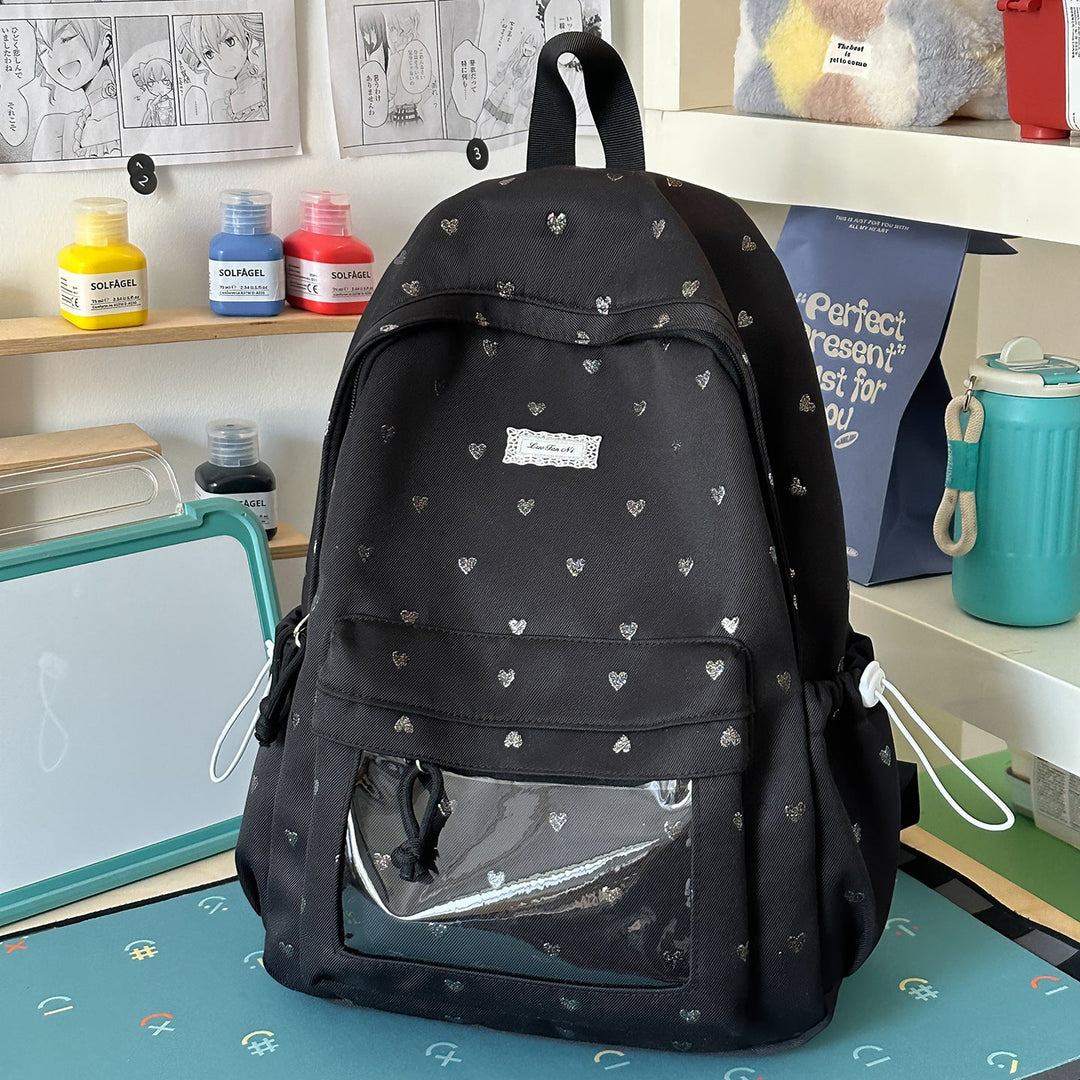 Cute heart-patterned women's backpack for school, college, or casual travel. Durable & stylish daily carry bag.