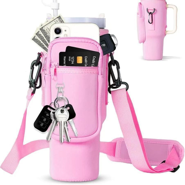 Vibrant pink insulated water bottle for women, complete with a functional, hands-free carry bag.