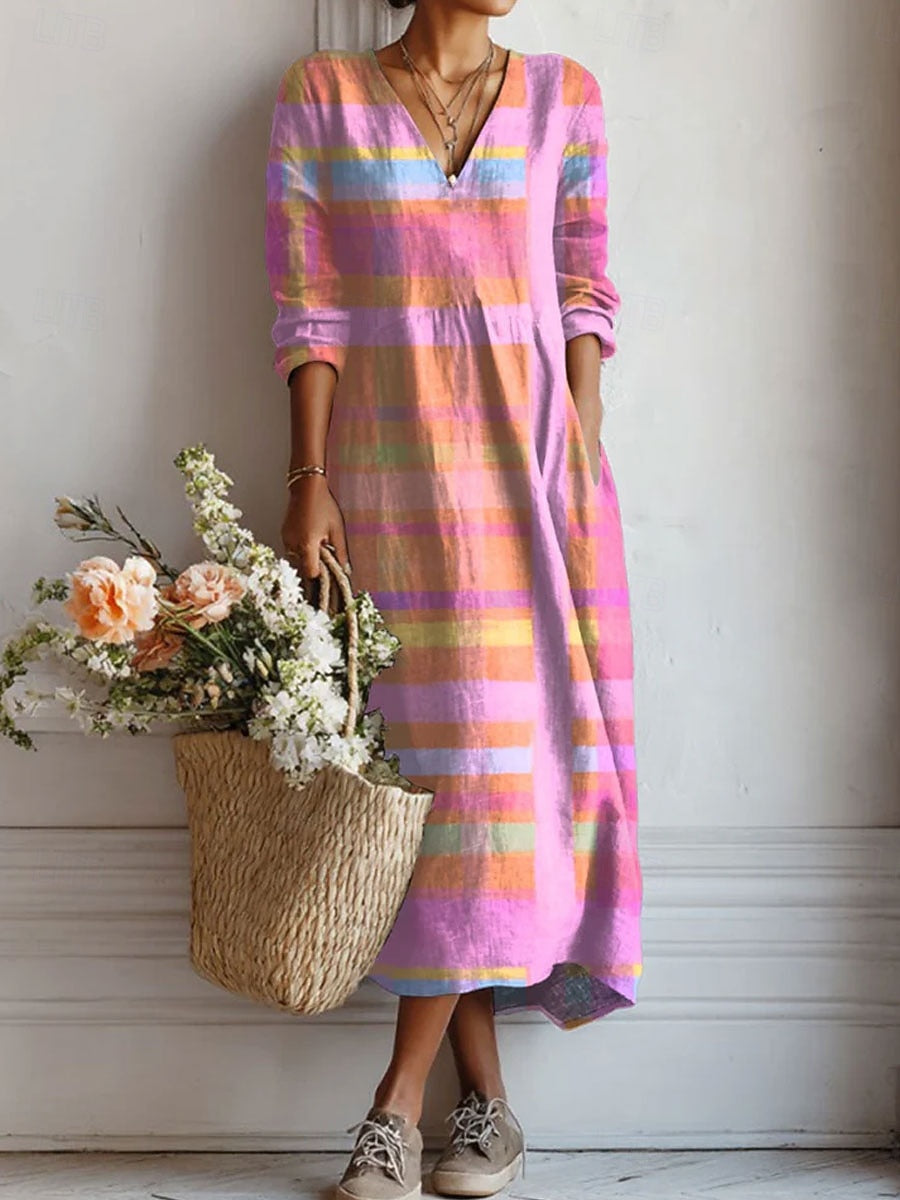 Women's pink v-neck comfort dress with pockets for everyday wear. Relaxed fit, perfect for summer casual style.