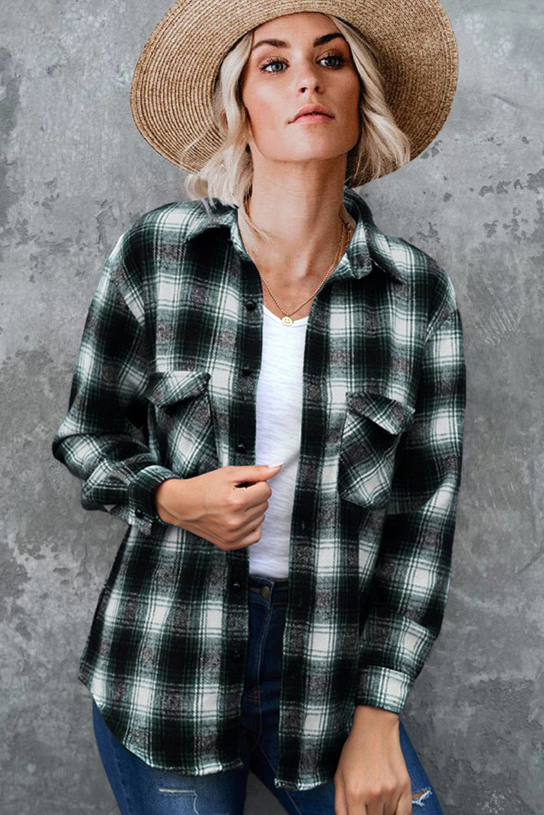 Women's plaid button-up shirt jacket with front pockets for casual fall layering.
