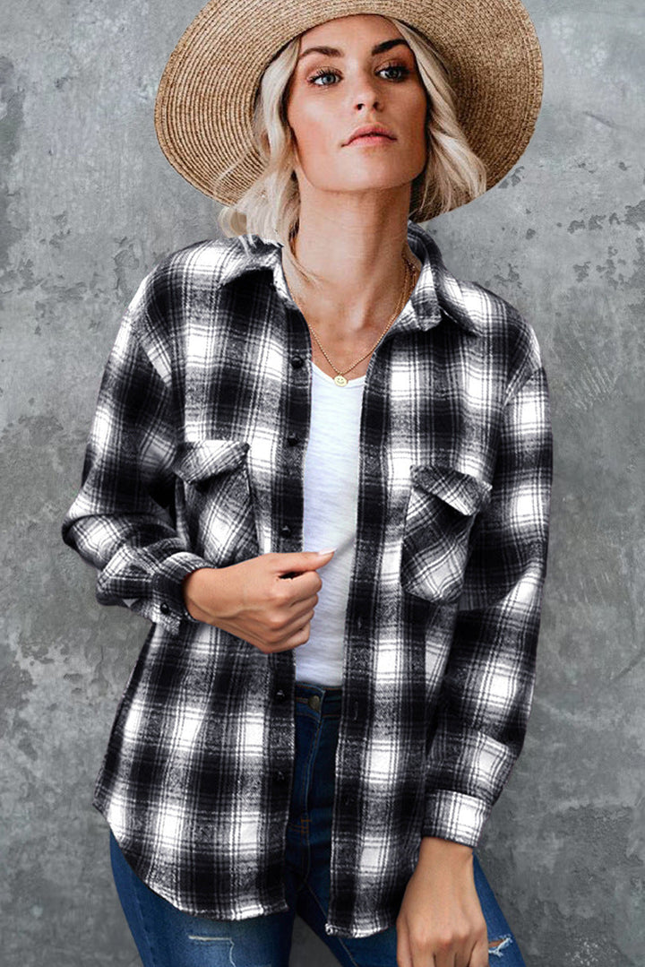 Cozy women's plaid button-up shacket, ideal for stylish layering in fall.