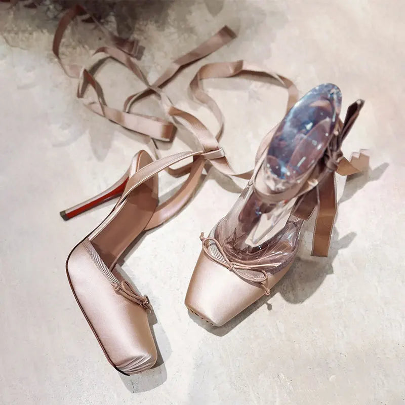 Sophisticated women's high heels, featuring a platform and secure ankle strap for comfortable special occasions.