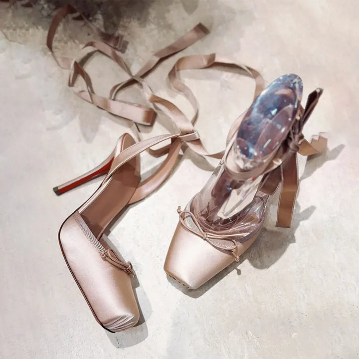 Sophisticated women's high heels, featuring a platform and secure ankle strap for comfortable special occasions.