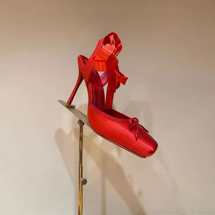 Stylish women's platform high heels with an ankle strap, designed for comfortable wear at special events.