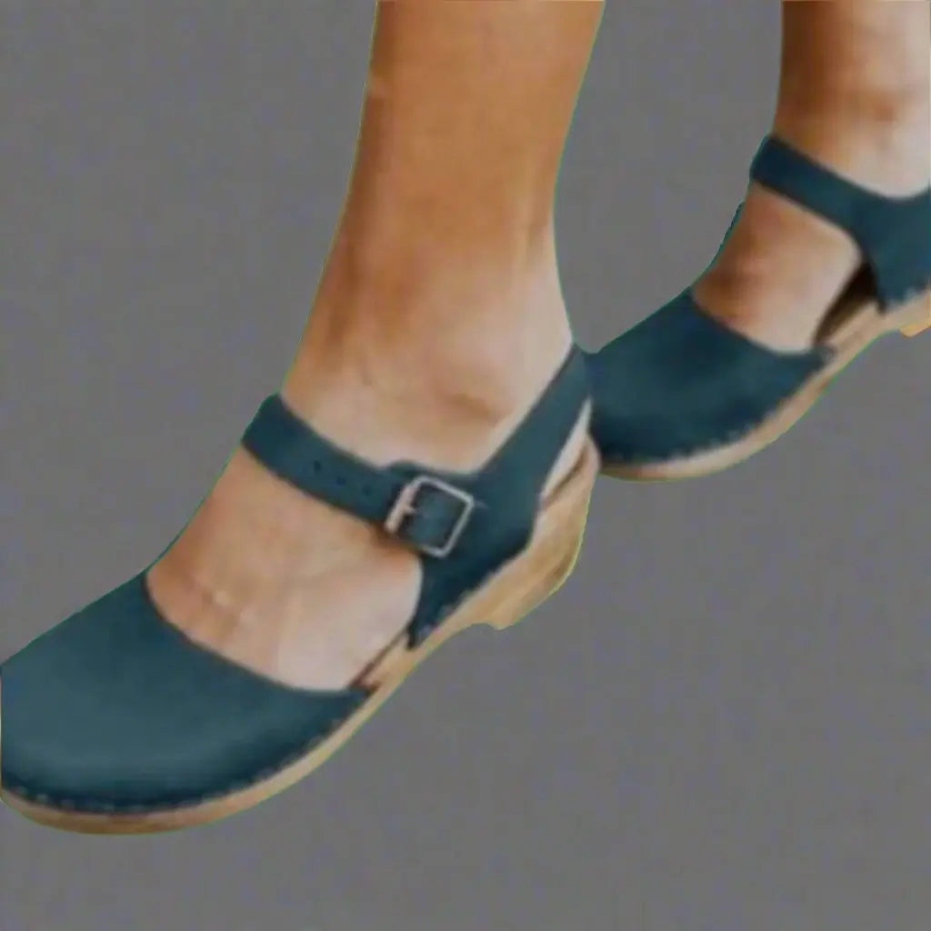 Stylish women's platform sandals, low block heel, secure ankle strap. Versatile footwear for casual to dressy occasions.