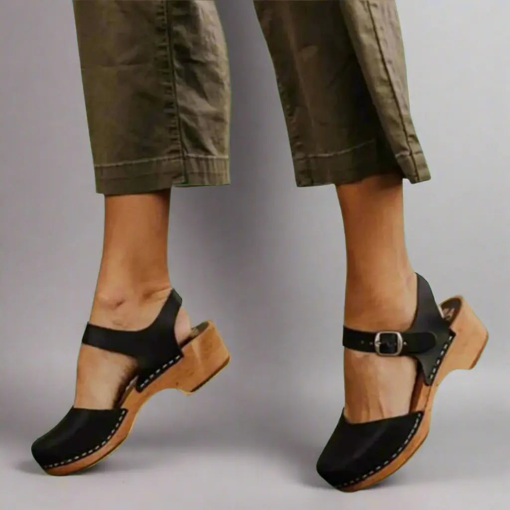 Chic women's platform sandals with low block heel & supportive ankle strap, essential for summer fashion.