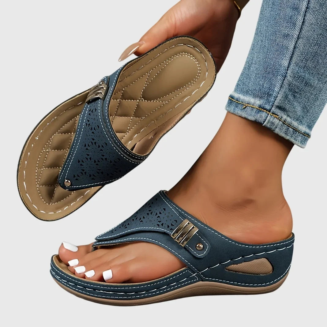 Fashionable women's summer sandals. Platform slip-on style with a unique cut-out thong strap.