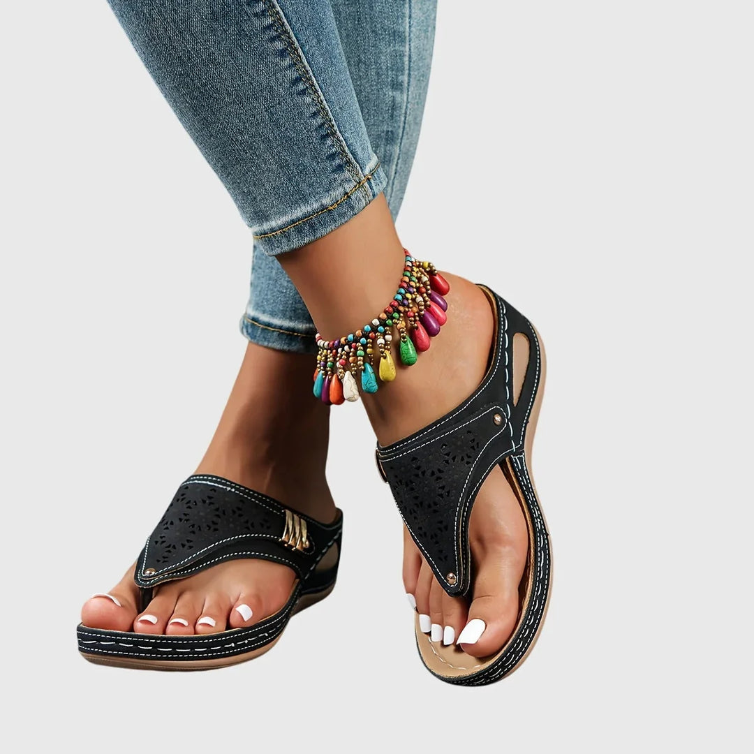 Modern women's platform sandals. Slip-on design with a stylish cut-out thong strap. Great for fashion footwear.