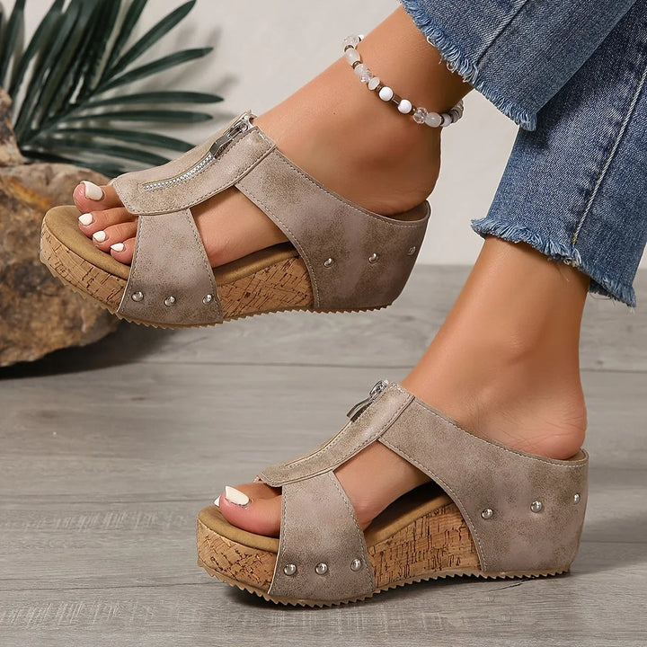 Casual women's platform slip-on wedge sandals, featuring an open-toe design & practical zipper. Summer footwear.