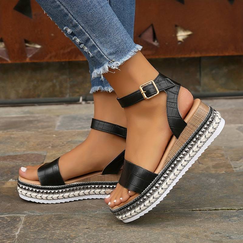 Apricot women's platform strap sandals. Stylish open-toe summer footwear, comfortable for beach or holiday.