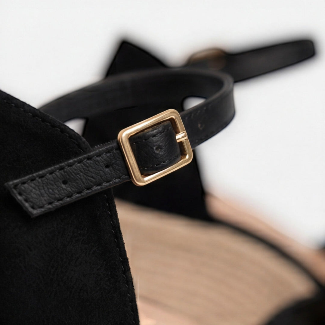 Stylish black platform espadrille sandals for women, featuring a comfortable wedge & ankle strap.