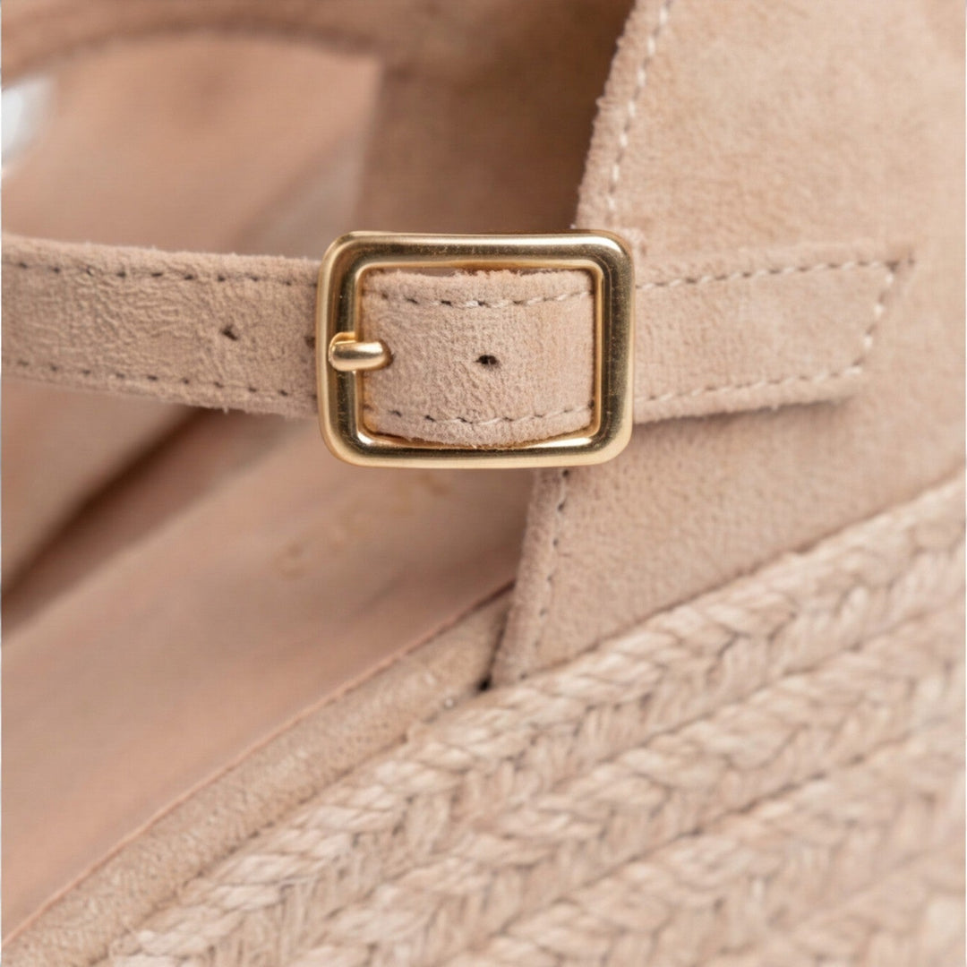 Beige women's espadrille platform sandals, wedge heel, and adjustable ankle strap for vacation.