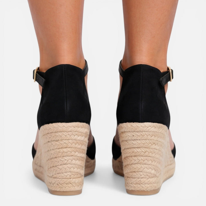 Elegant women's black platform espadrille wedge sandals, casual summer footwear with ankle strap.