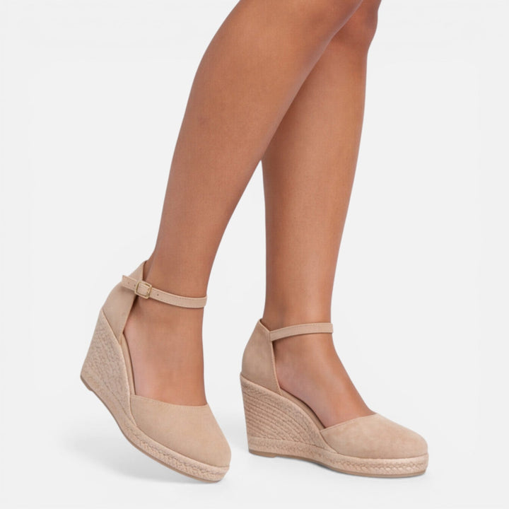 Versatile beige women's espadrille platform sandals, chic wedge design & comfortable ankle strap.