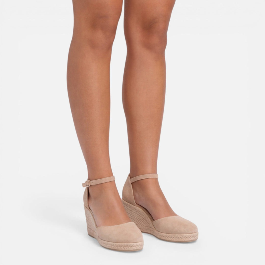 Beige women's platform wedge espadrille sandals, ideal for vacation, with comfortable ankle strap.
