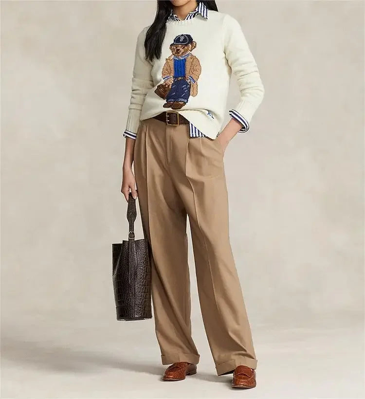 Women's playful bear sweater. Cozy long-sleeve top for cheerful winter fashion & casual comfort.