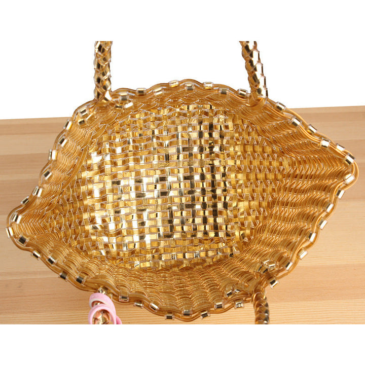 Chic women's woven beach bag, a playful summer accessory with unique charm.