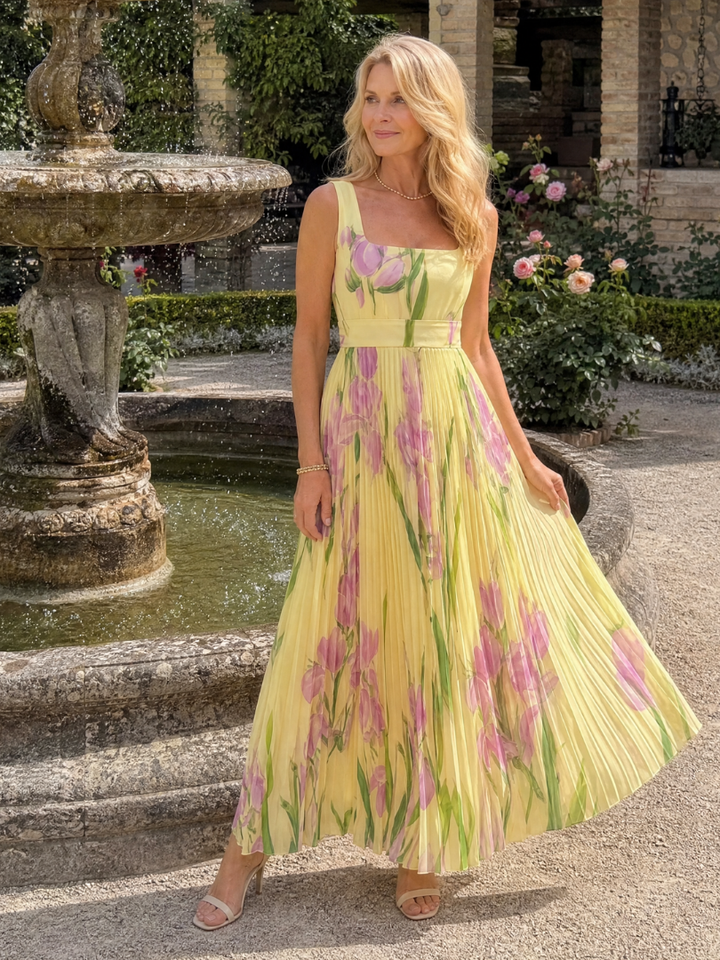 Beautiful women's floral pleated midi dress, sleeveless & comfortable for everyday summer style.