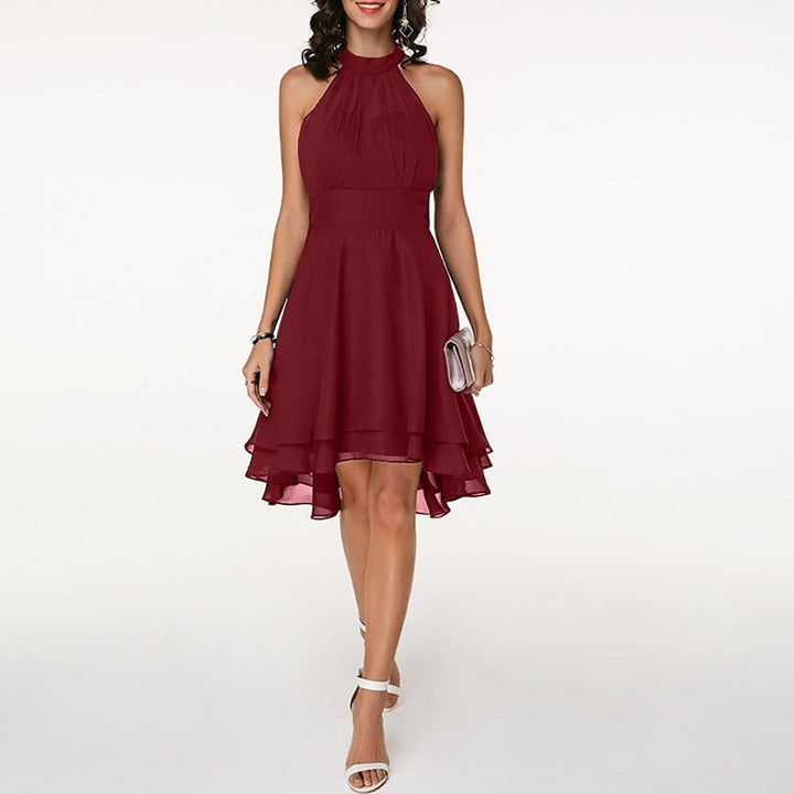Fashionable women's halter mini dress, pleated and layered, ideal for cocktails & parties.