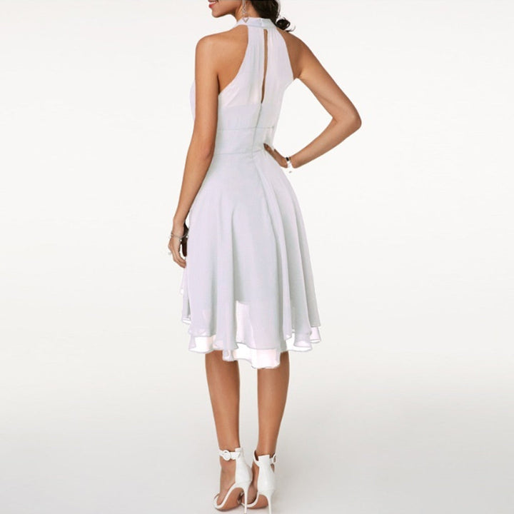 Women's evening dress: layered pleated mini dress with a flattering halter neck.