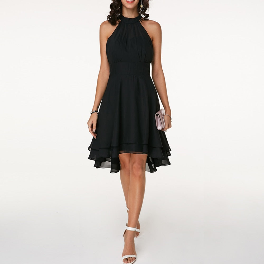 Stylish layered mini party dress for women, with pleated details & a halter neck.