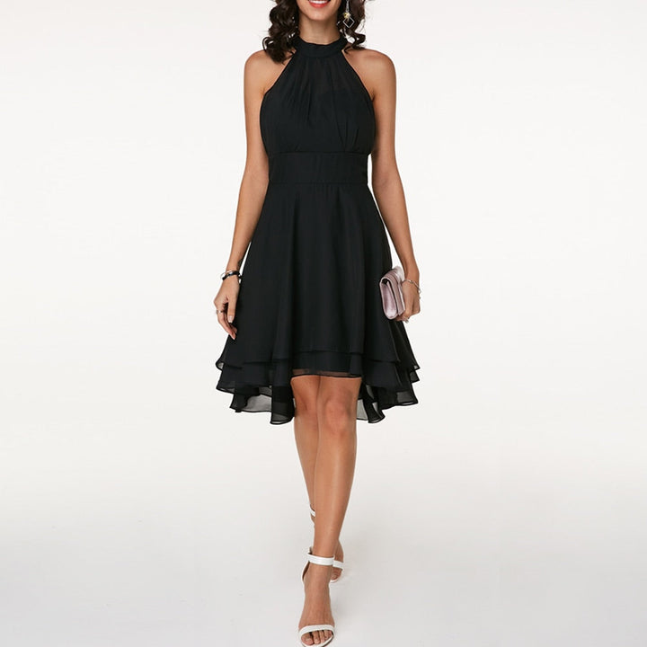 Stylish layered mini party dress for women, with pleated details & a halter neck.