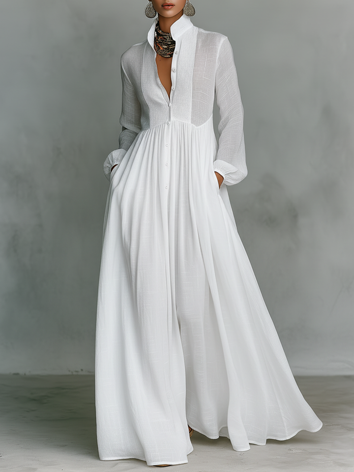 Women's pleated pintuck maxi dress with long sleeves & button front. Effortless style & comfort for everyday.