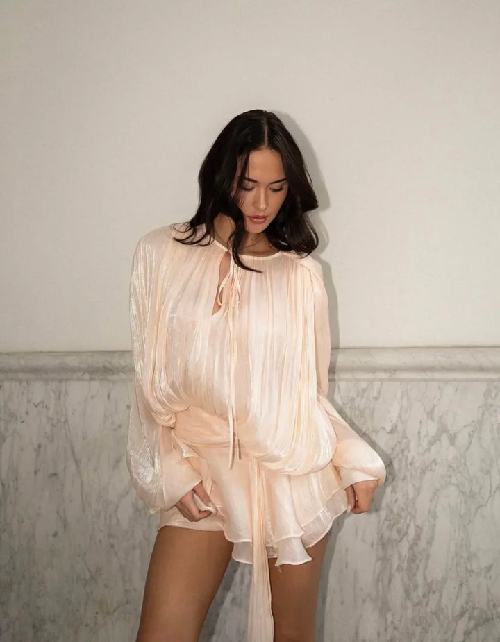 Elegant women's pleated mini dress with puff sleeves & tie waist, ideal for parties or summer events.