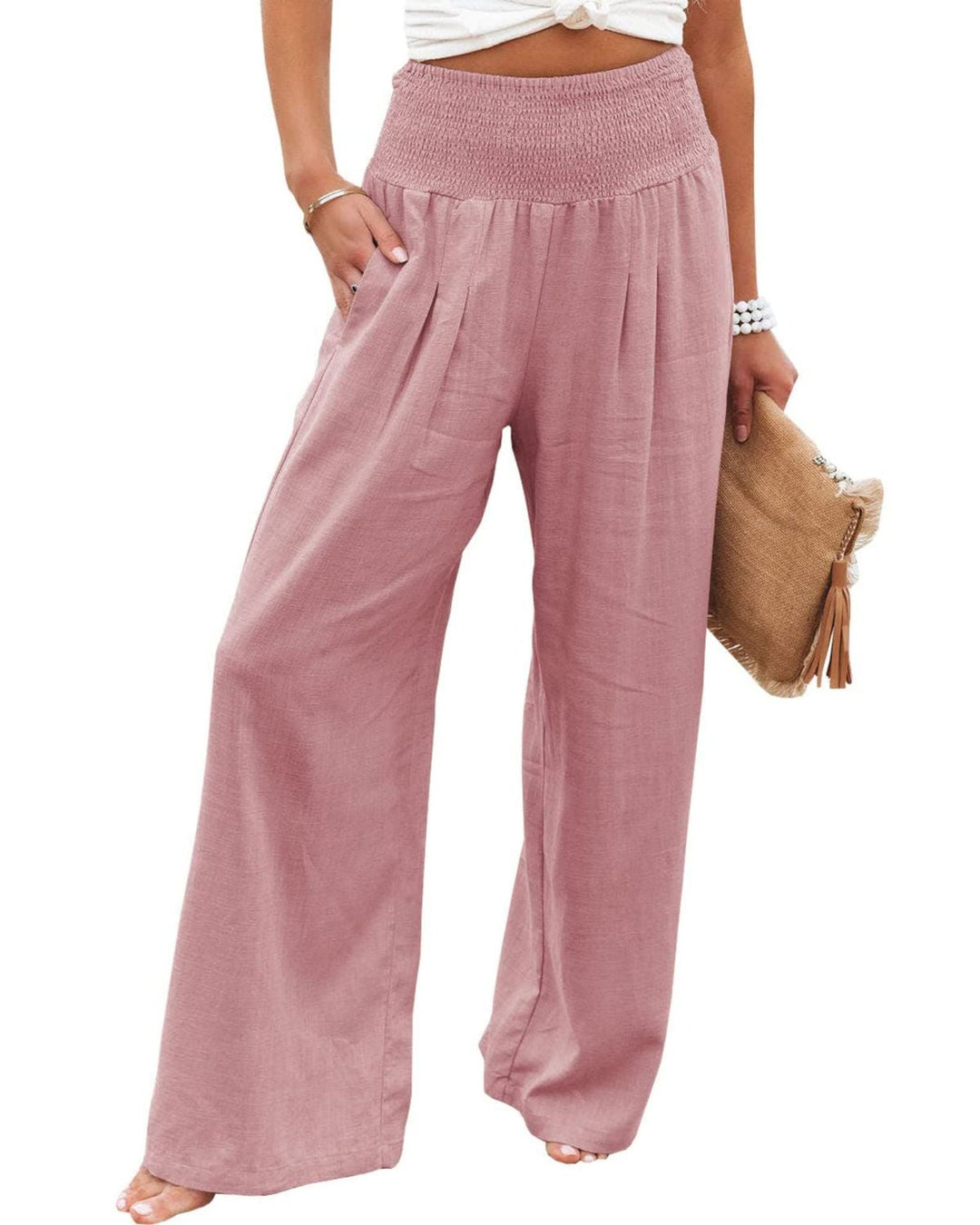 Women's pleated wide leg linen blend trousers with comfortable elastic waist.
