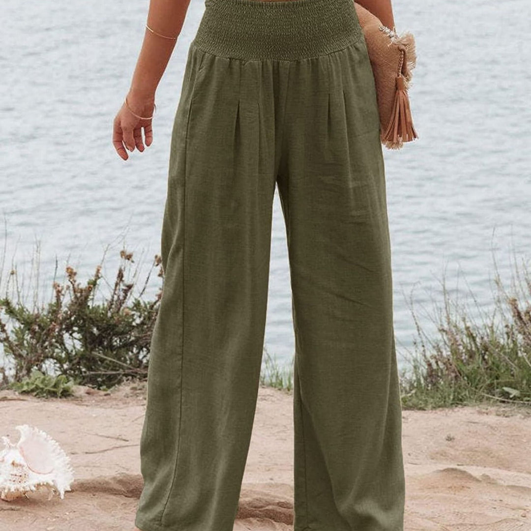 Trendy women's high waist wide leg pants, linen blend and pleated for summer.
