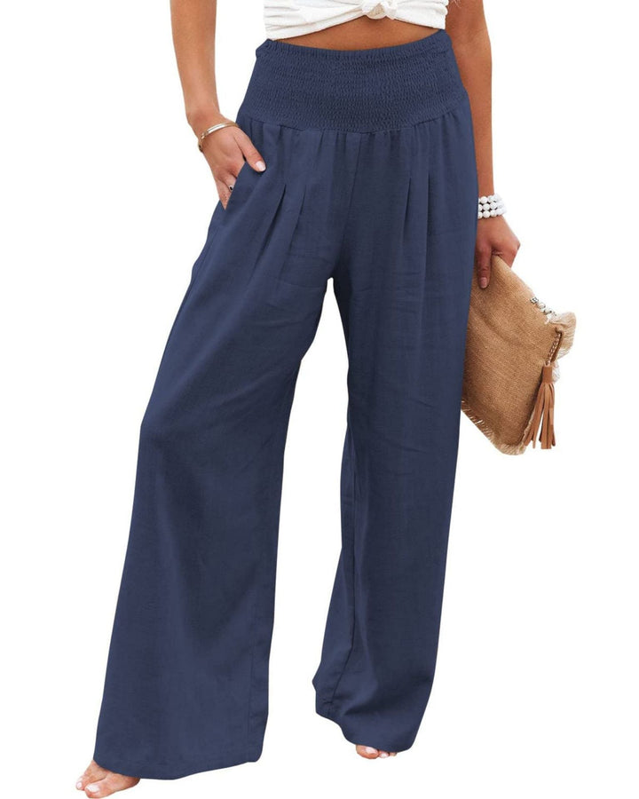 Pleated wide leg women's pants in linen blend, featuring a flexible elastic waist.