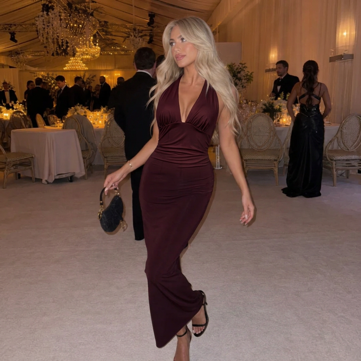 Women's plunge halter ruched fitted maxi dress for formal events & wedding guests. Elegant evening gown.