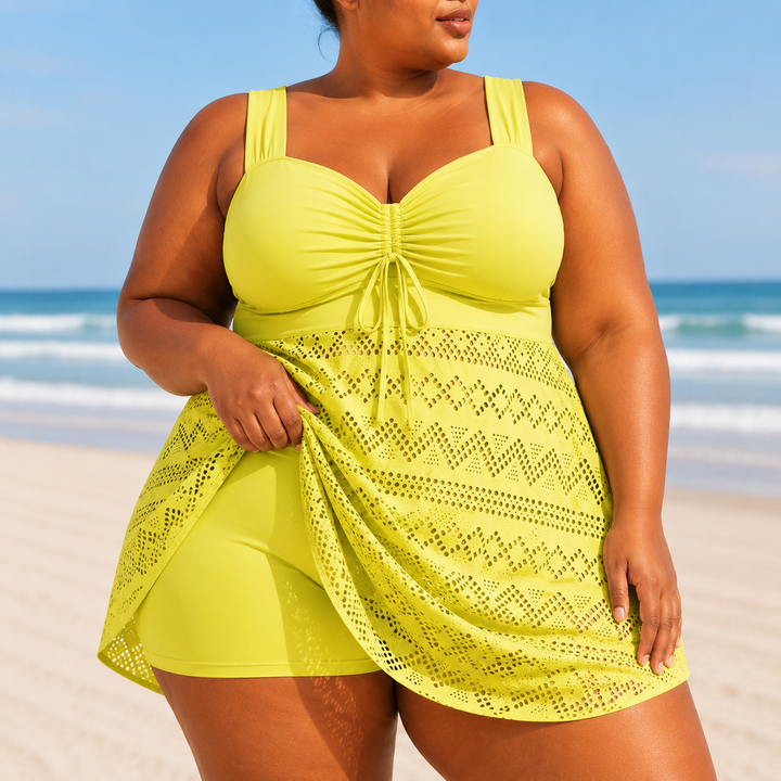Women's plus size swimwear: flowy beach swim dress, an elegant full coverage vacation outfit.