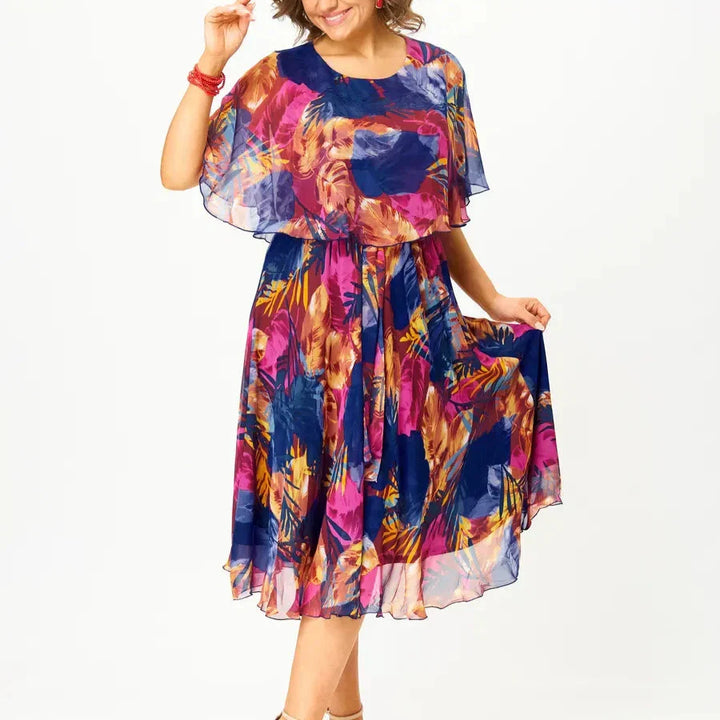 Elegant plus size A-line summer dress with a vibrant print, ideal for parties, vacations, and effortless style.