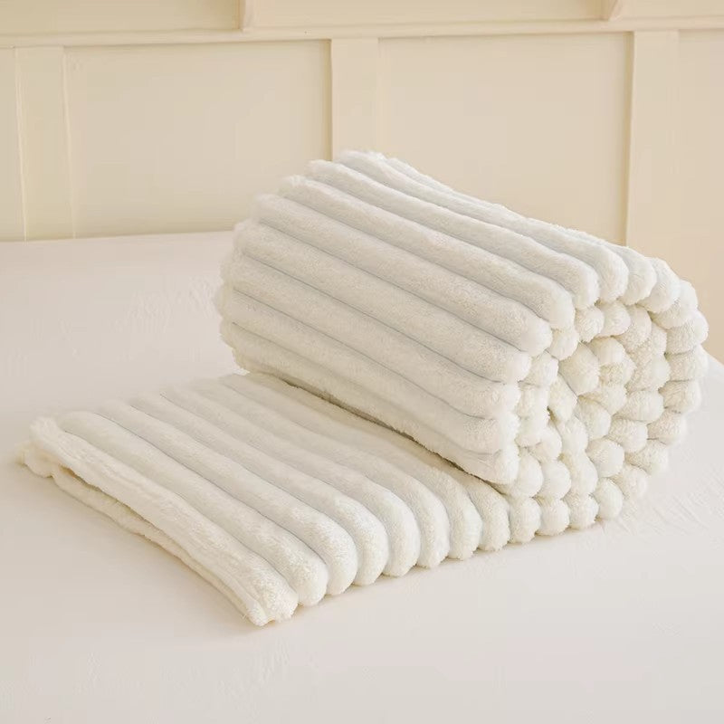 Luxurious women's plush blanket with unique 3D texture, perfect soft throw for home decor.