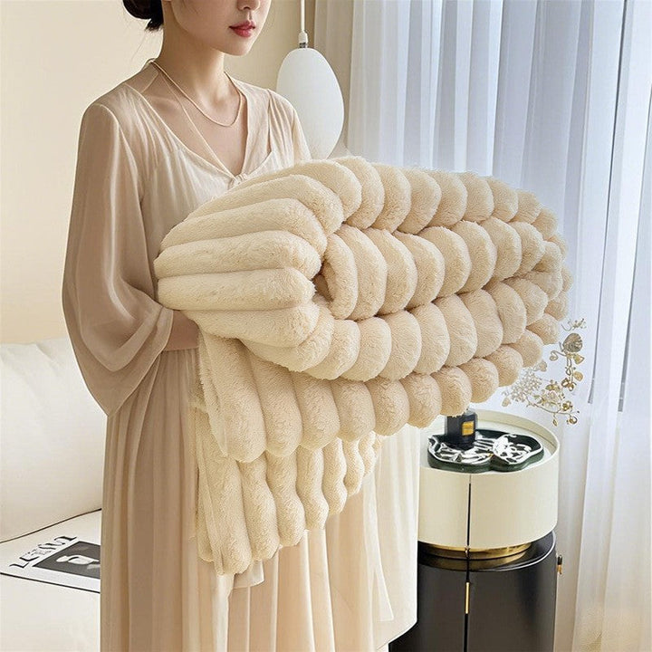 Warm and fuzzy women's 3D textured plush blanket, a super soft snuggle throw for ultimate comfort.