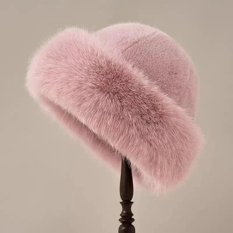 Cozy women's faux fur winter hat with a wide cuffed brim, providing warmth & comfort in cold weather. Plush & soft.