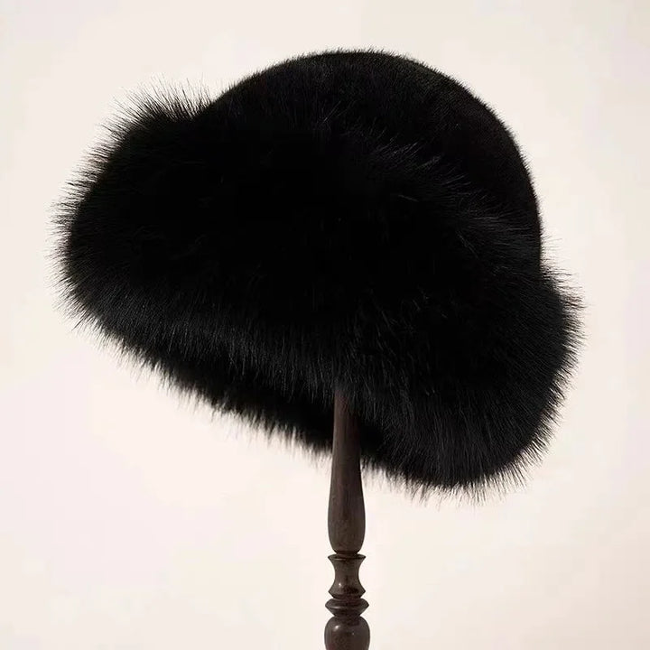 Luxurious plush faux fur winter hat for women, with a wide cuffed brim for extra warmth. Elegant & soft ladies' hat.