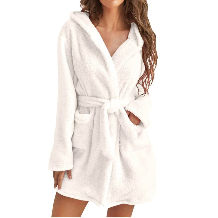 Soft and warm hooded bathrobe for women, perfect for relaxing at home.
