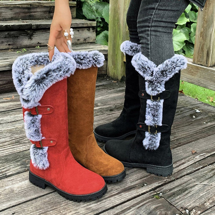 Stylish women's tall buckle winter boots with a cozy plush lining, perfect for cold weather.