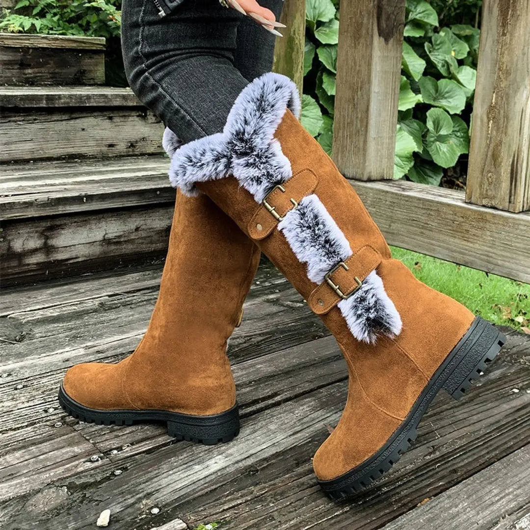 Comfortable women's knee-high winter boots, plush-lined for warmth, with fashionable buckle accents.
