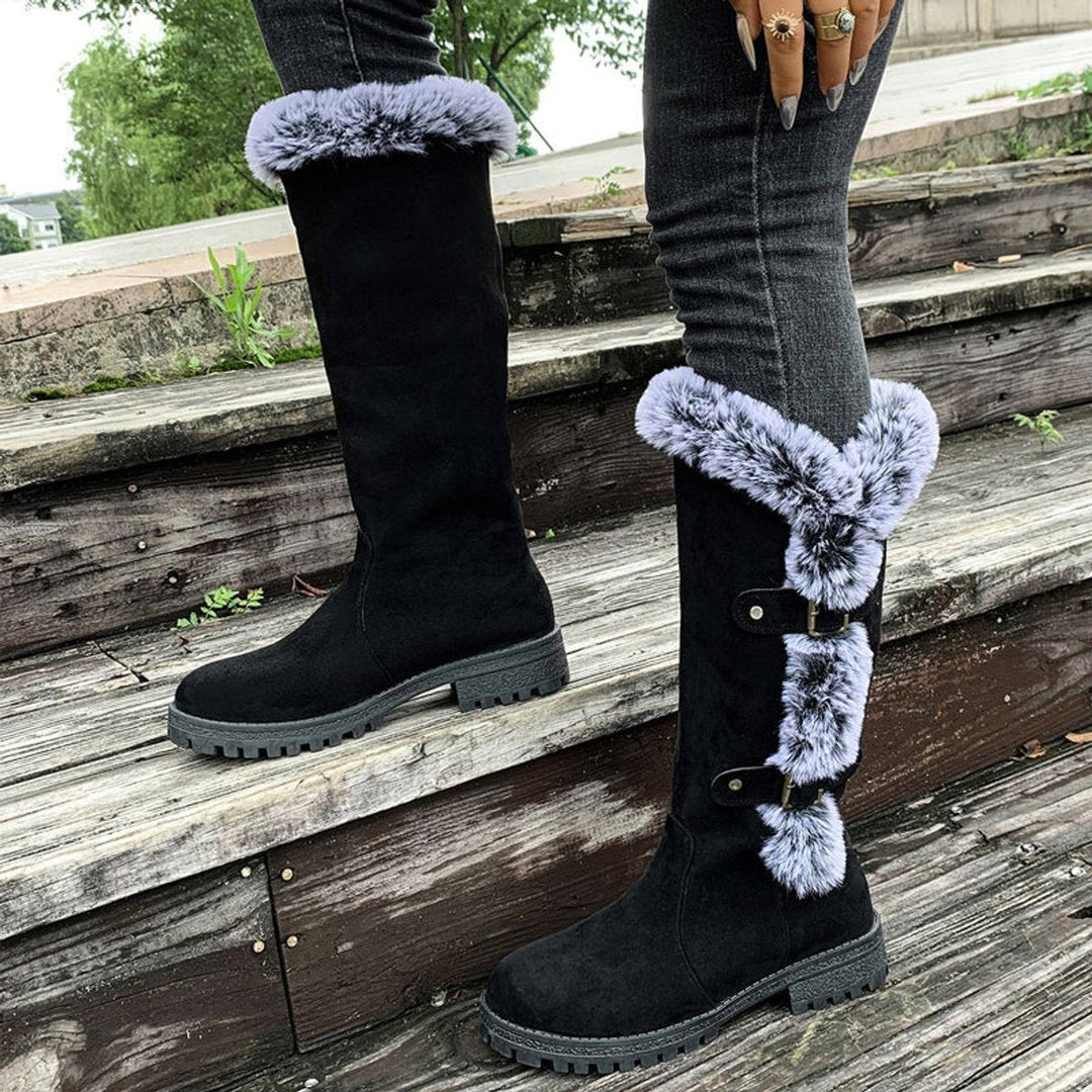 Step into warmth with these women's buckle knee-high winter boots, featuring a cozy plush lining.