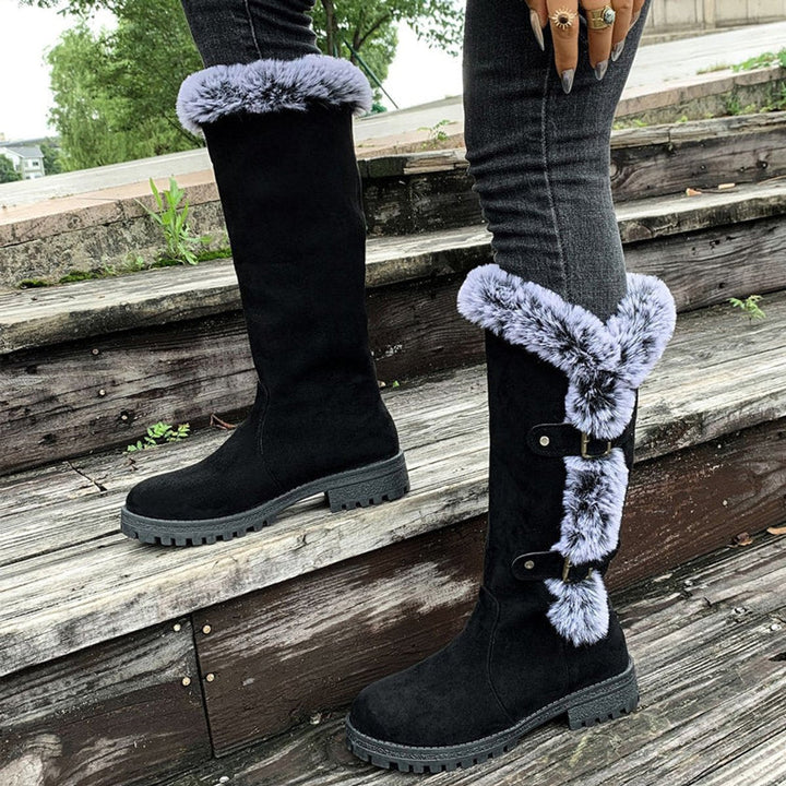 Step into warmth with these women's buckle knee-high winter boots, featuring a cozy plush lining.