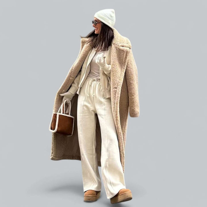 Cozy women's maxi plush teddy coat, ideal for winter warmth. Stylish long black outerwear for elegant fashion.