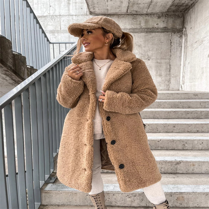 Women's cozy plush button-front winter coat featuring an elegant notched collar design.