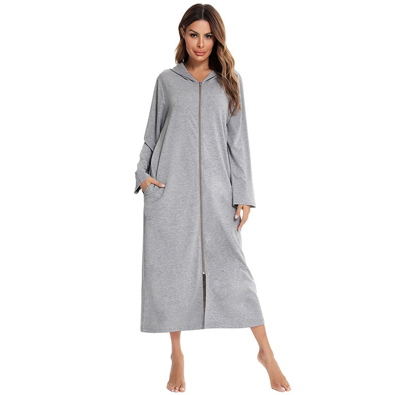 Mid-length plush women's nightdress with full zip-up front & practical pockets.