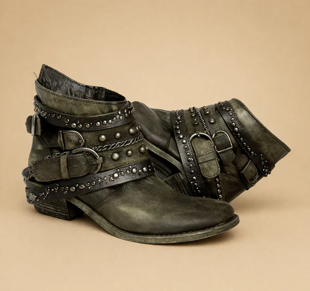 Woman wearing stylish brown cowboy boots, ideal for summer fashion.
