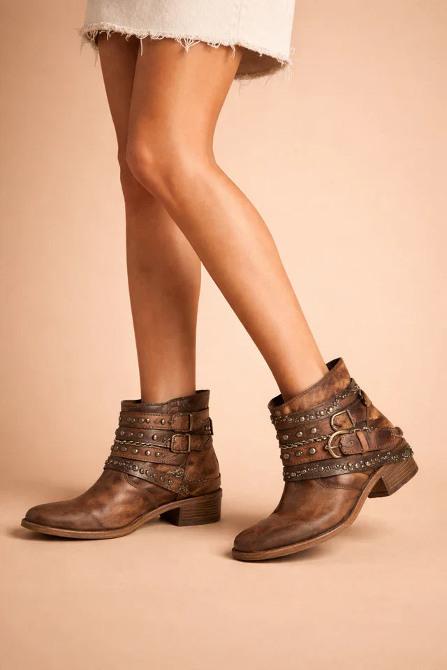 Durable women's western boots with a comfortable low heel for all-day wear.