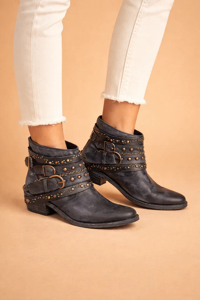 New collection of women's pointed toe boots, blending Western and modern styles.